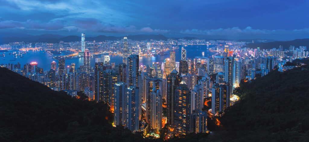 A breathtaking view of Hong Kong's illuminated skyline at night from Victoria Peak.